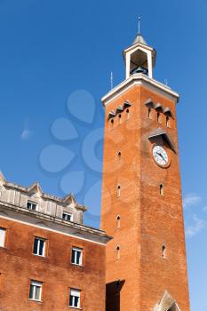 Tall red clock tower of comune di Gaeta, Italy