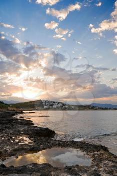 Bright Mediterranean sunrise at the stone coast . Avsallar, Alanya, Turkey