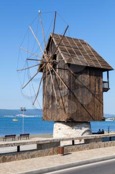 Old wooden windmill on the sea coast, the most popular landmark of old Nesebar town, Bulgaria