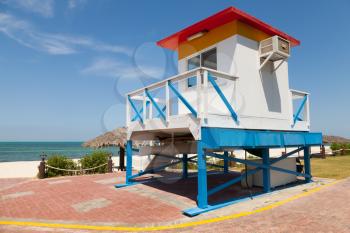 Colorful lifeguard tower on the beach in sunny day