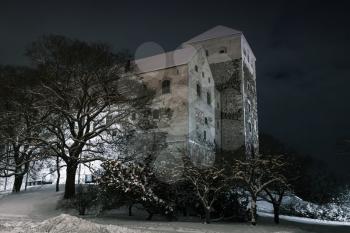 Turku Castle at dark night, it is a medieval building in the city of Turku in Finland. It was founded in the late 13th century and stands on the banks of the Aura River