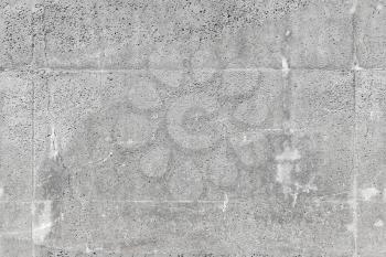 Seamless background texture of gray concrete wall, frontal photo