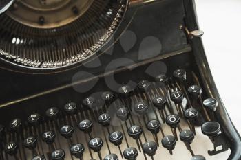 Vintage manual typewriter machine, fragment with keys, photo with soft selective focus