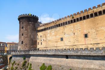 Tower and wall of the Castel Nouvo in Naples, Italy. It was first erected in 1279, one of the main architectural landmarks of the city