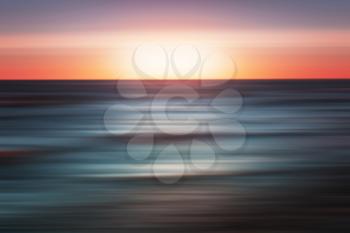 Abstract colorful digital background with blurred horizon, sea and sunset