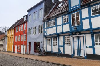 Narrow street with colorful houses. Flensburg, Germany
