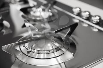 Modern gas stove burner made of shiny stainless steel