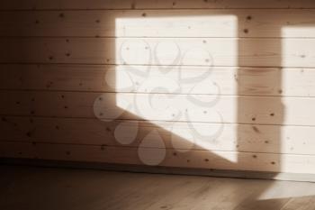 Wall with shadow pattern. Empty new wooden house interior, background photo