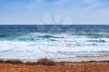 Mediterranean Sea landscape, coastal waves on empty beach. Ayia Napa, Cyprus