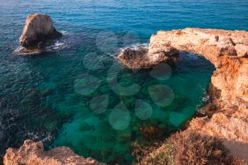 Love bridge. Natural stone arch on Mediterranean Sea coast. Summer landscape of Ayia Napa, Cyprus island
