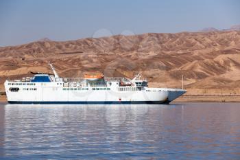 White passenger ferry enters Aqaba port, Red Sea, Jordan