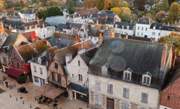 Aerial cityscape of Amboise located in the Indre-et-Loire department of the Loire Valley in France. Traditional old French living houses