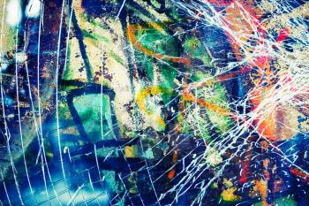 Abstract colorful urban grunge background, graffiti with broken glass on concrete wall