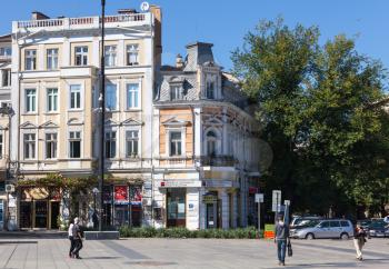 Ruse, Bulgaria - September 29, 2014: Street view with ordinary citizens walking on city square