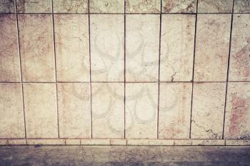 Abstract urban background interior with stone tiling on the wall and road pavement, retro photo filter effect