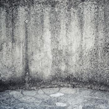 Empty square Interior background texture with dark ancient gray concrete wall and floor made of stone
