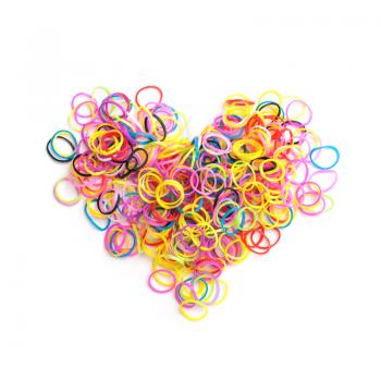 Small round colorful rubber bands for making rainbow loom bracelets in heart shape isolated on white background