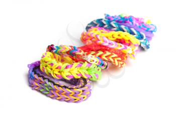 Colorful rubber band bracelets isolated on white, trendy kids fashion accessories 