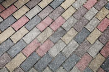 Road pavement pattern with colorful stones