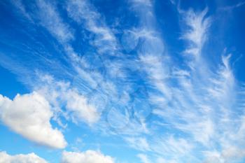 Blue sky with white altocumulus clouds layer, natural background photo texture