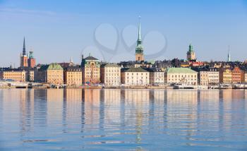Cityscape of Stockholm. Gamla Stan city district in summer morning with German Church spire as a skyline dominant