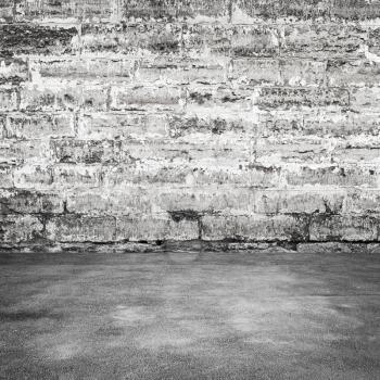 Old gray concrete wall and asphalt pavement, abstract empty square interior background texture