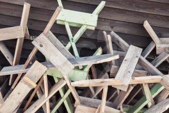 Pile of chaotic wooden constructions, rural background photo