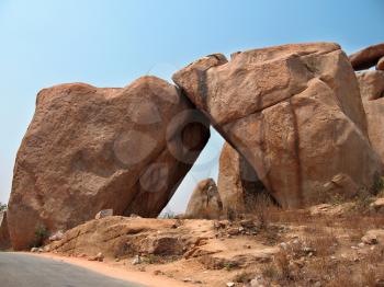 Stone against stone on the red ground