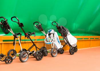 Trolleys for tennis inside the tennis court 