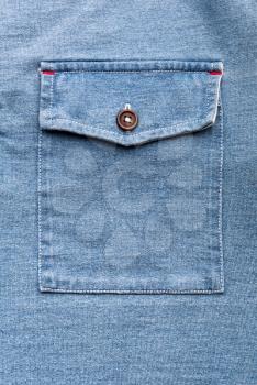 A jeans pocket with plastic button