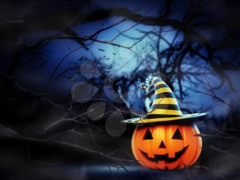 Helloween pumpkin in the spooky night forest