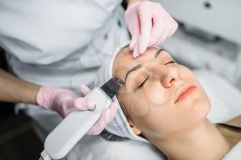 Rejuvenation procedure, getting rid of wrinkles, cosmetology clinic. Facial skincare in spa salon