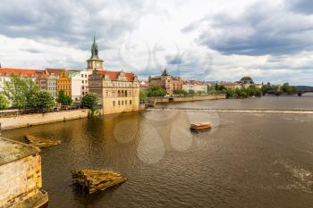 Prague cityscape with river, Czech Republic. European town with ancient architecture buildings, famous place for travel and tourism