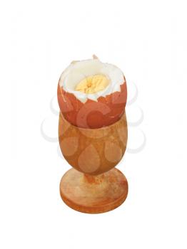 Boiled egg in a wooden eggcup