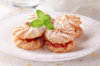 Jam sandwich cookies powdered with icing sugar
