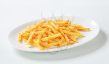 Portion of French fries on plate