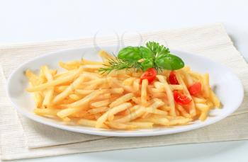 Fresh fried French fries on plate