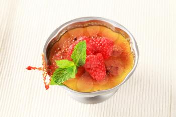 Creme brulee in a metal serving dish