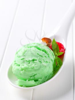 Scoop of green ice cream on a spoon