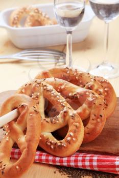 Soft pretzels topped with caraway seeds and salt