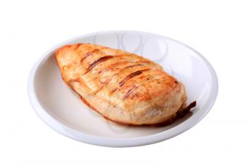 Grilled chicken breast on a plate