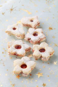 Christmas jam cookies sprinkled with icing sugar