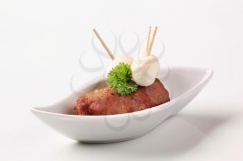 Minced meat kebab with mozzarella cheese balls
