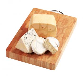 Selection of cheeses on a cutting board