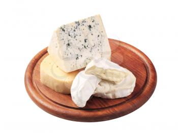 Selection of cheeses on a cutting board