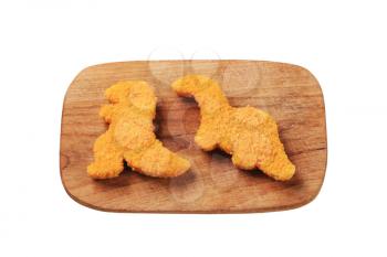 Convenience food - Dinosaur-shaped breaded nuggets
