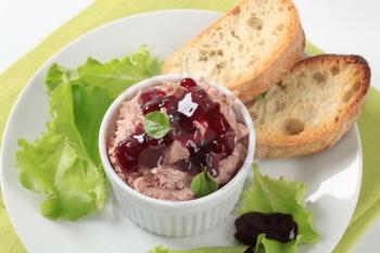 Liver mousse topped with cranberry sauce