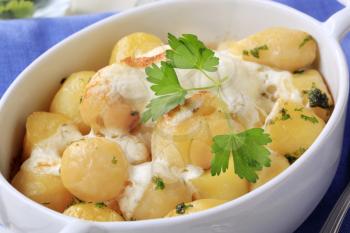 Potatoes and cream baked in a casserole dish