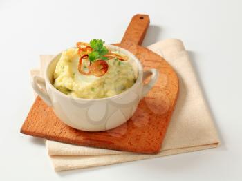 Mashed potato topped with browned onion