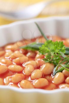 Baked beans in a porcelain casserole dish